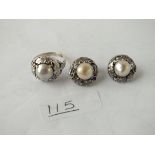 A pair of arts & crafts pearl & silver earrings & matching ring