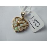 A opal & diamond heart pendant in 9ct