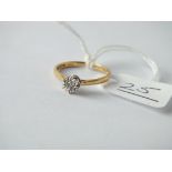 A solitaire diamond ring in 18ct gold - size K - 1.5gms