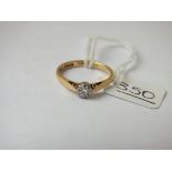 A solitaire diamond ring in 18ct gold - size P - 3gms