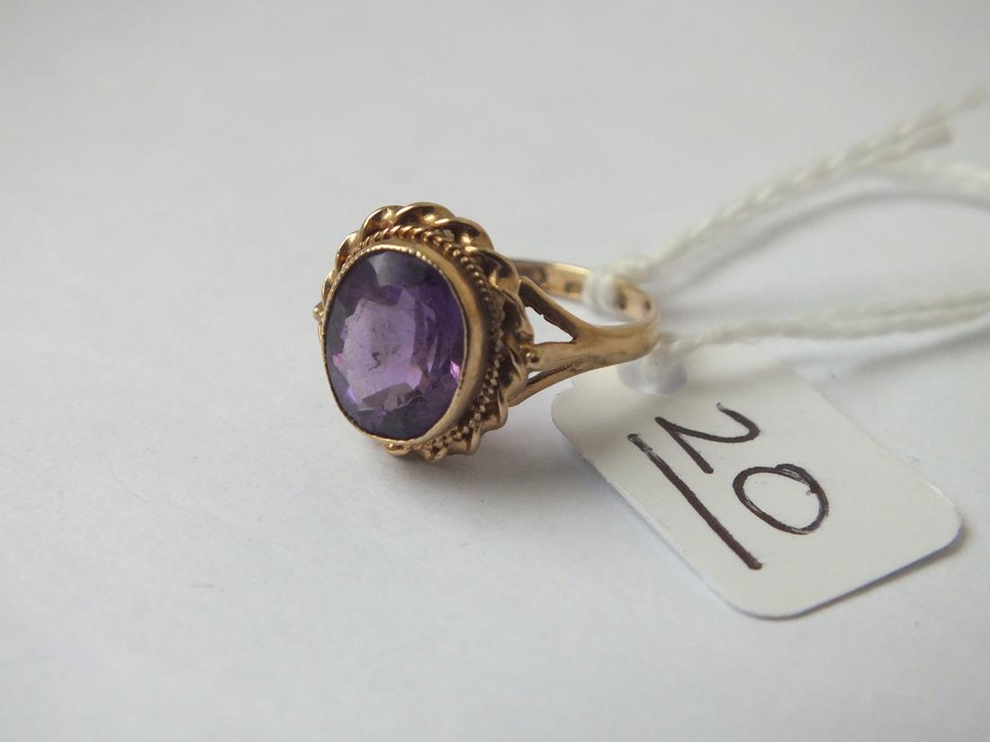 A amethyst ring with rope border in 9ct - size J - 2.5gms - Image 3 of 4