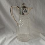 A claret jug with hinged cover and cut glass body - 11" high - London 1912