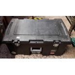 BLACK PLASTIC STORAGE TRUNK ON WHEELS