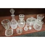 SHELF OF CUT GLASS DECANTERS, VASES, BISCUIT BARREL ETC