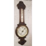 1920'S CARVED OAK BANJO STYLE ANEROID BAR & THERMOMETER (2FT 10 LENGTH)
