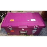 RED PLASTIC WHEELED STORAGE TRUNK