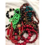 BAG OF RED, BROWN, GREEN, & BLUE NECKLACES