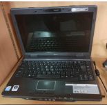 AN ACER TRAVEL MATE LAP TOP COMPUTER