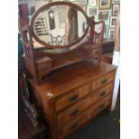 LARGE MAHOGANY & WALNUT ARTS & CRAFTS DRESSING TABLE / CHEST OF DRAWERS WITH OVAL MIRRORED BACK &