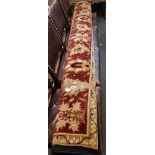 FINE QUALITY DEEP RED & BROWN WOOLLEN GROUND CARPET