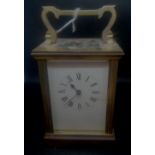 A brass cased carriage clock