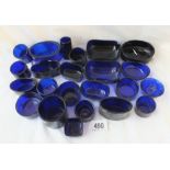 A box of blue glass liners - twenty pieces