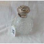 An Edwardian salts bottle with hinge cover and stopper - cut glass body - B'ham 1907