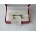 A pair of silver boxed cufflinks