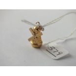 A charm in the form of a windmill in 9ct - 1.5gms