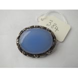An oval blues stone brooch
