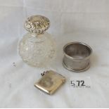 A vesta case plus napkin ring and a circular salts bottle