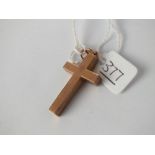 A rose gold cross in 9ct - 2.3gms
