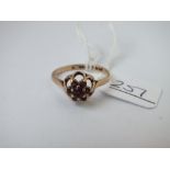 A 9ct garnet cluster ring - size N - 1.8gms