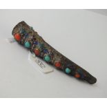 An unusual silver oriental enamelled brooch set wit coral and turquoise