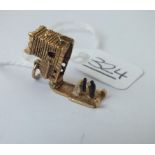 A charm in the form of a wedding in church 9ct - 3.9gms