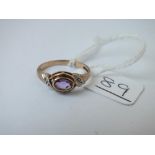 A 9ct amethyst and diamond ring - size M - 1.68gms