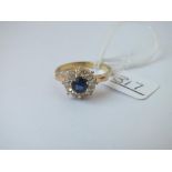 AN SAPPHIRE & DIAMOND CLUSTER RING IN 18CT GOLD - size S - 4.9gms