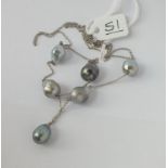 A WHITE GOLD & SOUTH SEA PEARL NECKLACE IN 18CT GOLD