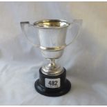 A small plain trophy cup with two angular handles - 5.5" high - Birmingham 1931