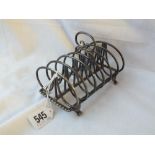 A good quality seven bar toast rack on paw feet - Chester 1907 by GN, RH - 285gms