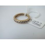 A CZ eternity ring in 14ct gold - size O - 2.8gms