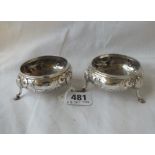 A pair of Victorian salts, each on three pad feet - 3" wide - London 1851 by WRS - 114 gms.