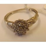 A white gold (9ct) diamond cluster ring - size M - 2.8gms