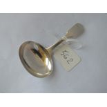 A Georgian fiddle pattern caddy spoon with oval bowl - London 1826