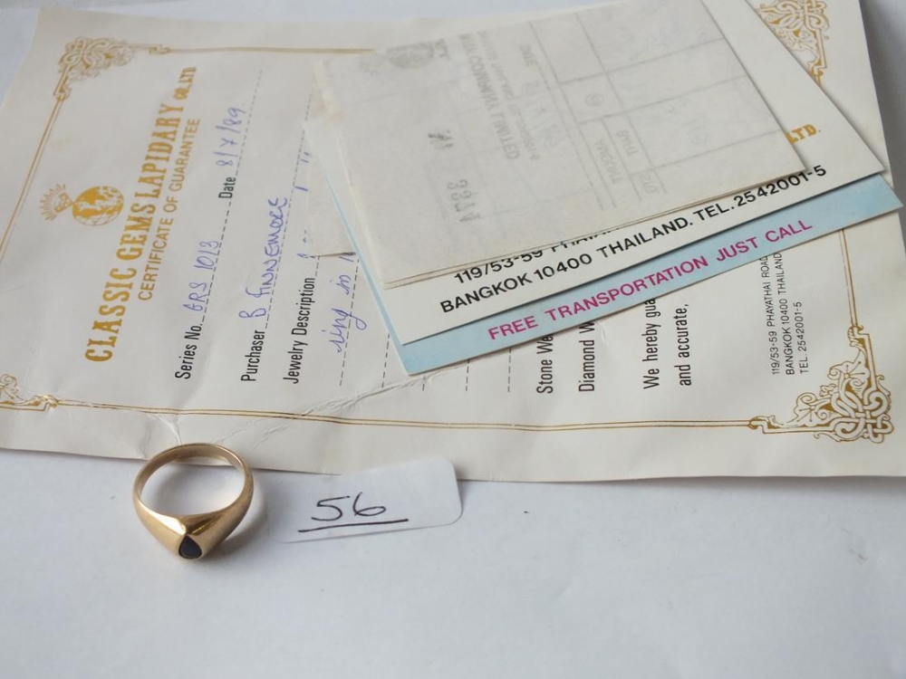 A sapphire ring in 14ct gold with paperwork - 4.4gms