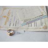 A sapphire ring in 14ct gold with paperwork - 4.4gms