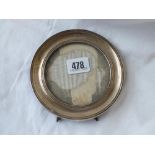 A circular photo frame with moulded border - 5.25" dia. - Birmingham 1919