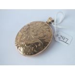 A LARGE OVAL LOCKET IN 9CT - 21.7gms