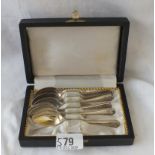 A set of six golfing spoons in fitted case - Sheffield 1932 - 81 gms.