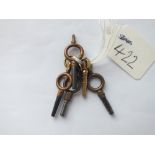 An antique watch key and five others