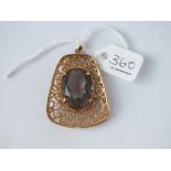 A fancy stone set pendant in 9ct - 9.6gms