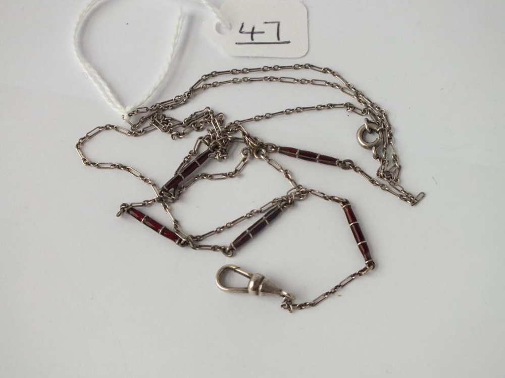 An antique silver and red enamel half-guard chain