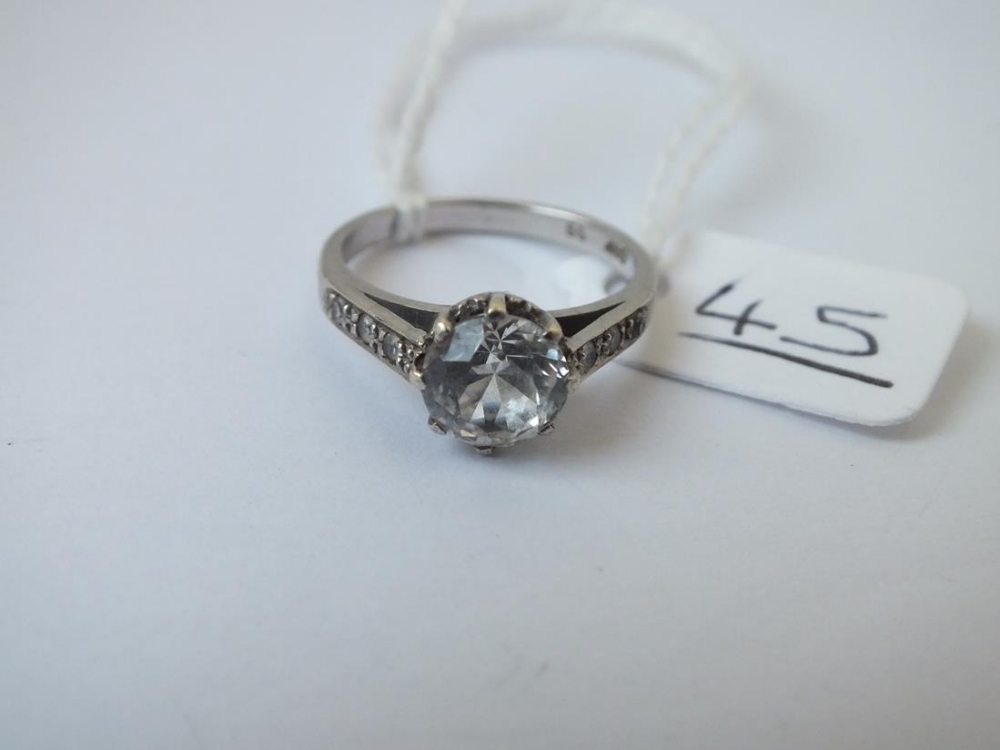 A white stone dress ring in 9ct - size M - 3.3gms