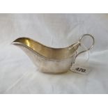 A small oval sauce boat with scroll handle - 5.5" long - Sheffield 1925 - 52 gms.