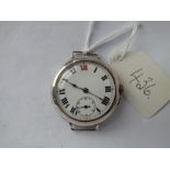 A silver trench-style wristwatch with seconds dial, in working order