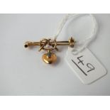 An antique heart and lovers knot brooch in 15ct gold