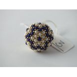 A large pearl & blue bead dome topped ring in 9ct - size M