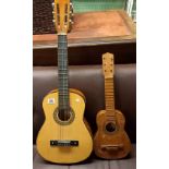 A HERALD ACOUSTIC SMALL GUITAR & A ROCA KIDS GUITAR