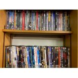 4 SHELVES OF MISC DVD's