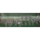2 SHELVES OF CUT GLASS WINE GLASSES, TUMBLERS, SHERRY GLASSES, GOBLETS ETC